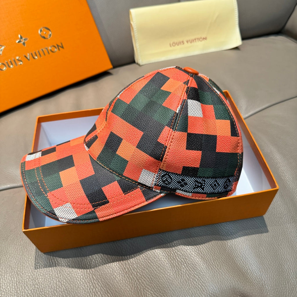 Louis Vuitton cap in orange, green, black, and white patchwork checks, side view.