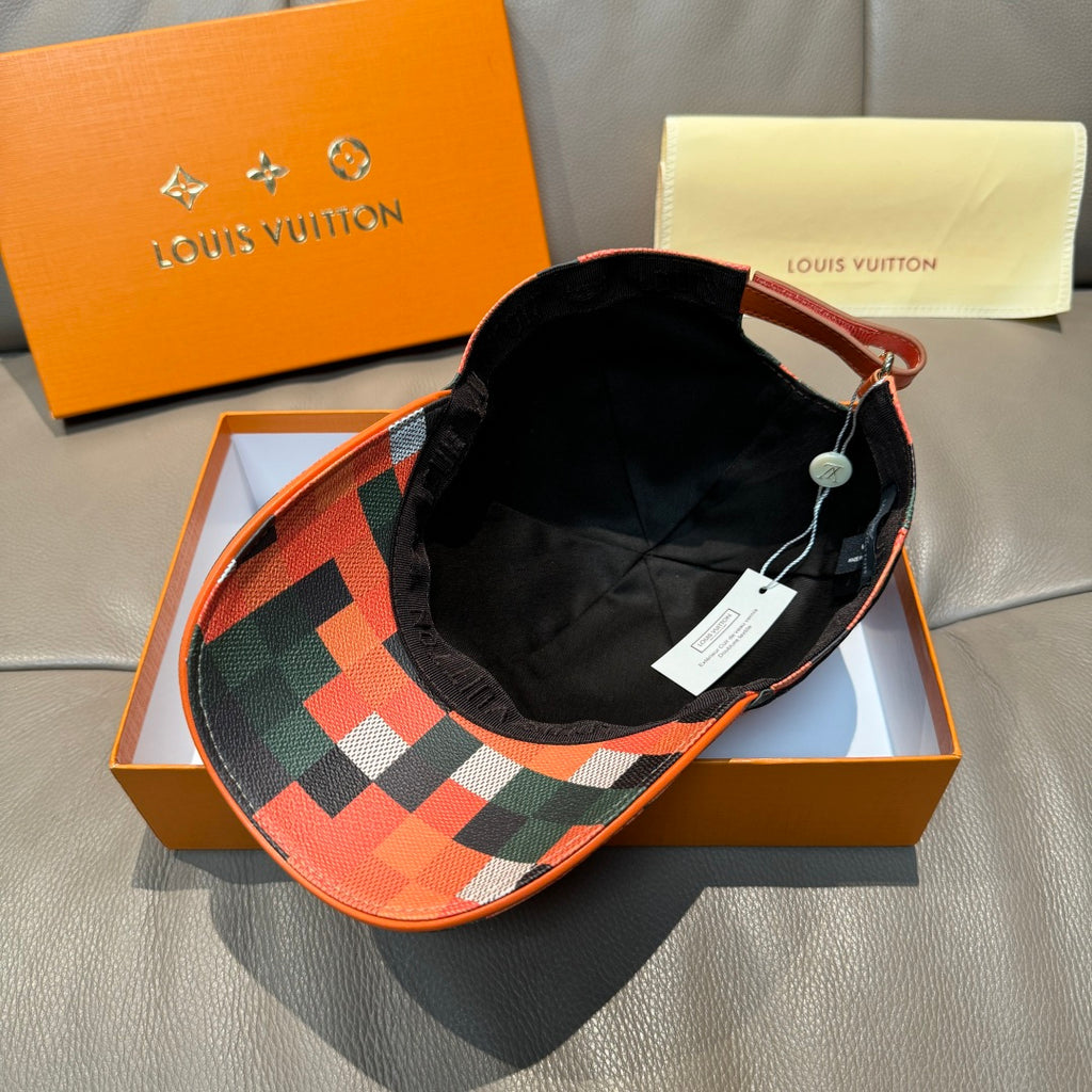 Louis Vuitton cap with black interior and multicolor geometric patchwork under brim edge.