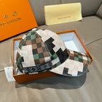 Louis Vuitton baseball cap with green, cream, and brown plaid panels and matching brim