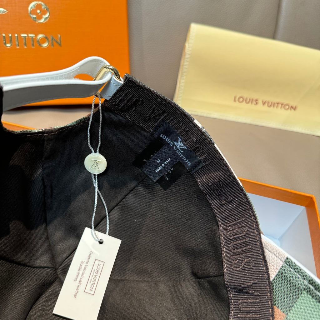 Louis Vuitton black cap with adjustable strap and hanging product tags