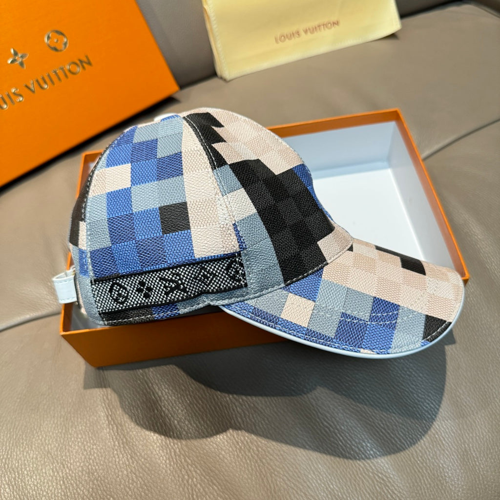 Louis Vuitton cap with blue, black, and white check pattern and branded band detail.