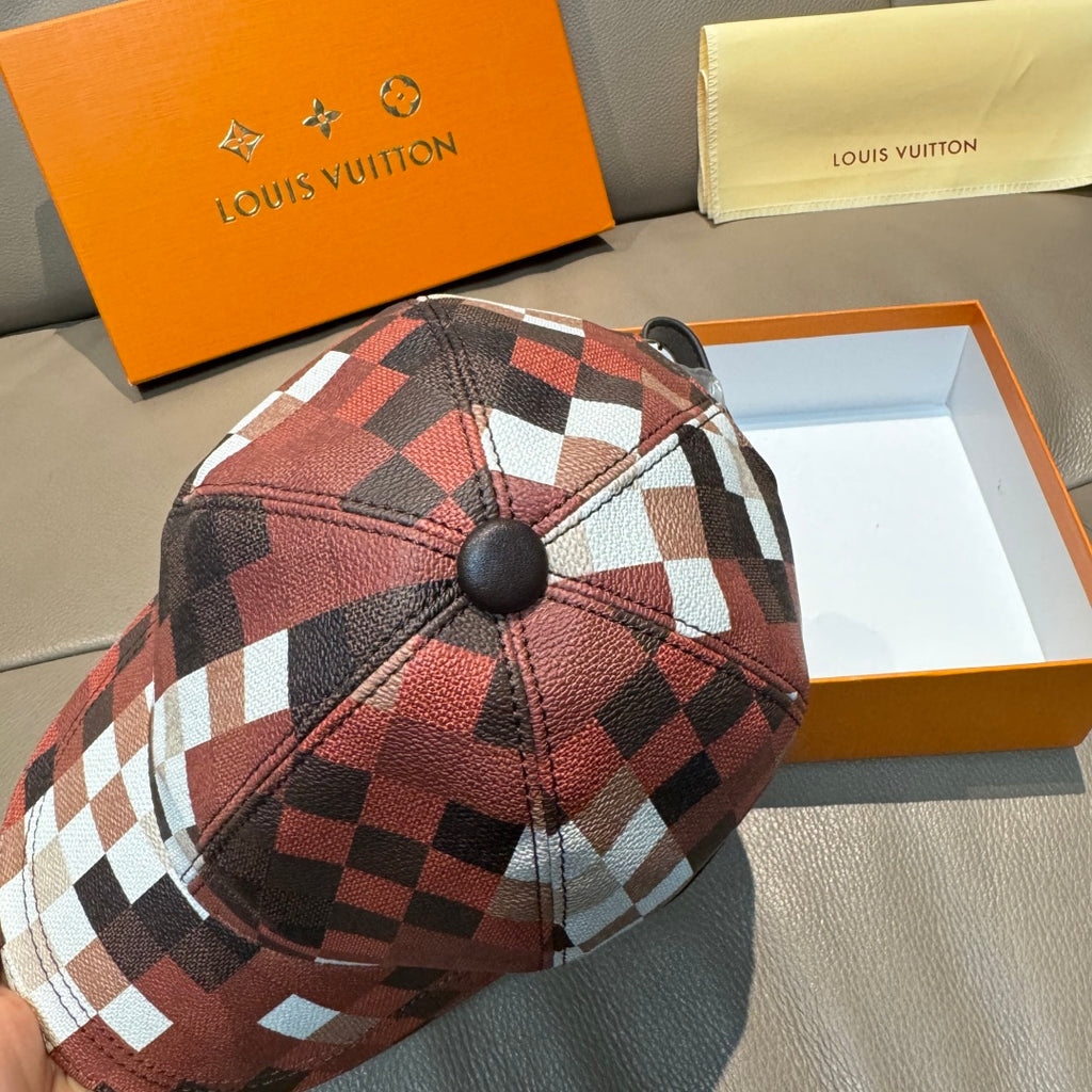 Louis Vuitton cap top with red, black, and white patchwork check pattern