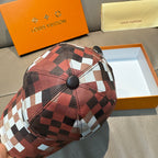 Louis Vuitton cap top with red, black, and white patchwork check pattern
