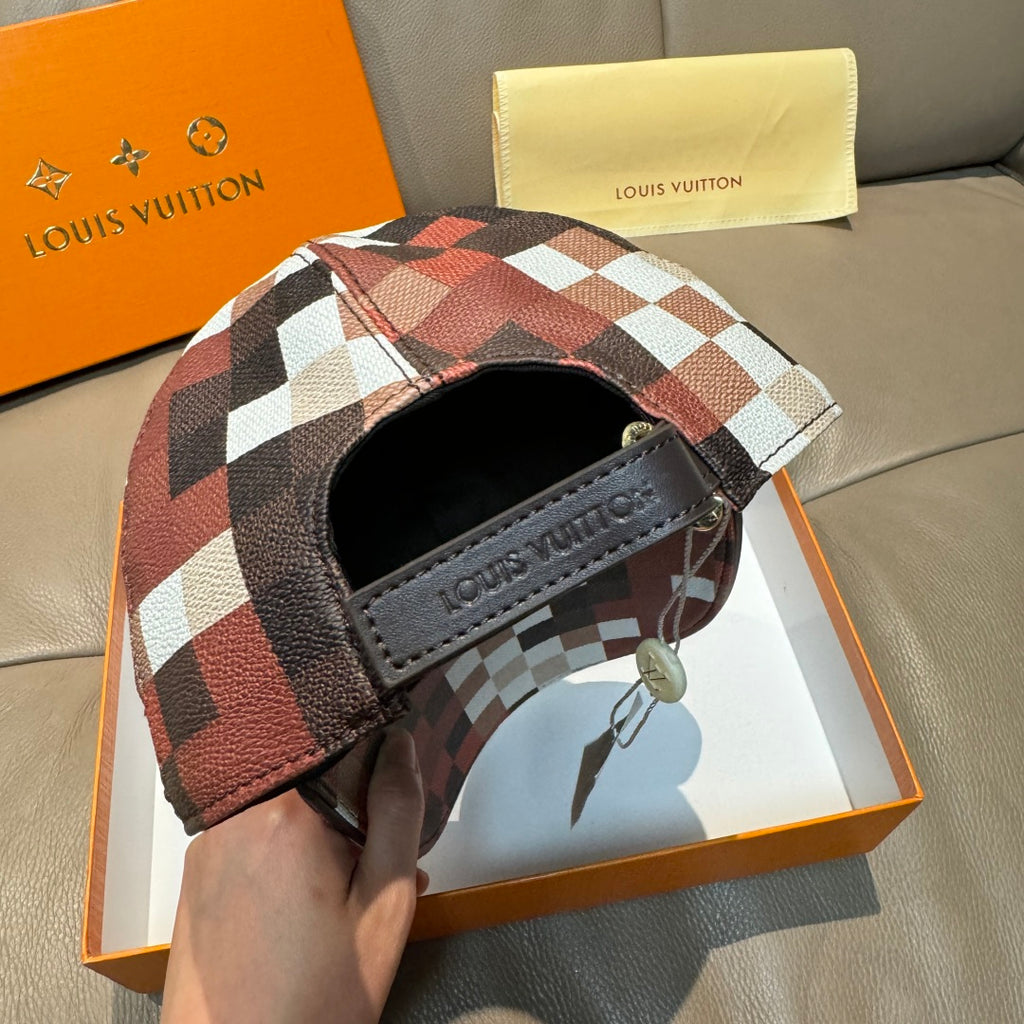 Louis Vuitton cap side with red, white, and black check patchwork and front label