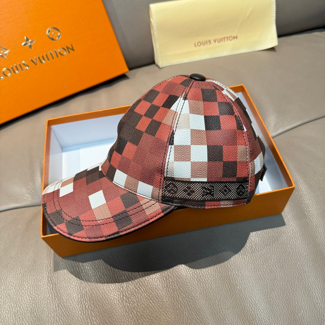 Louis Vuitton cap with red and black check design, curved brim, and adjustable strap