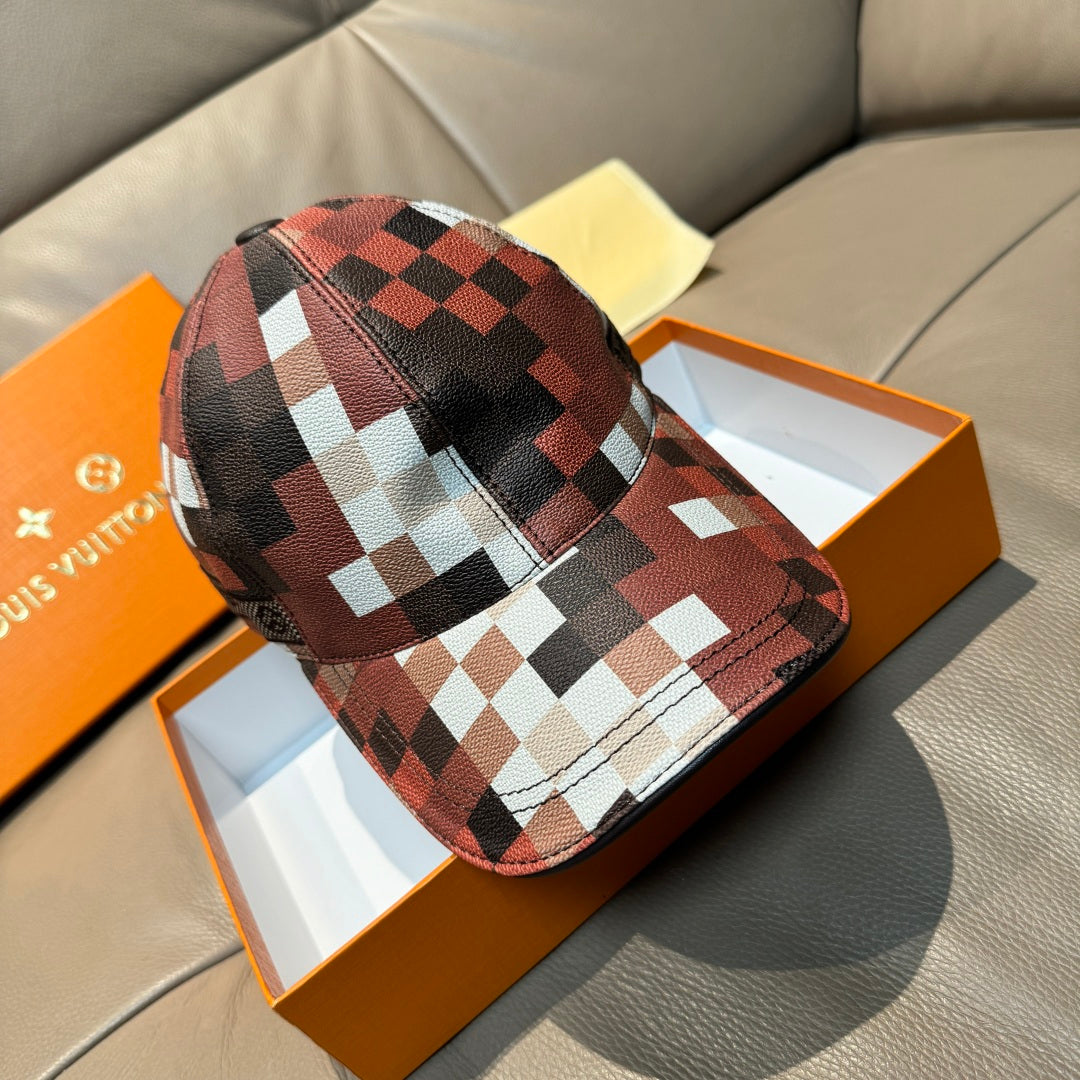 Louis Vuitton cap with red, black, and white check pattern panels and curved brim