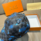Louis Vuitton baseball cap with blue and black checkered crown and black top button