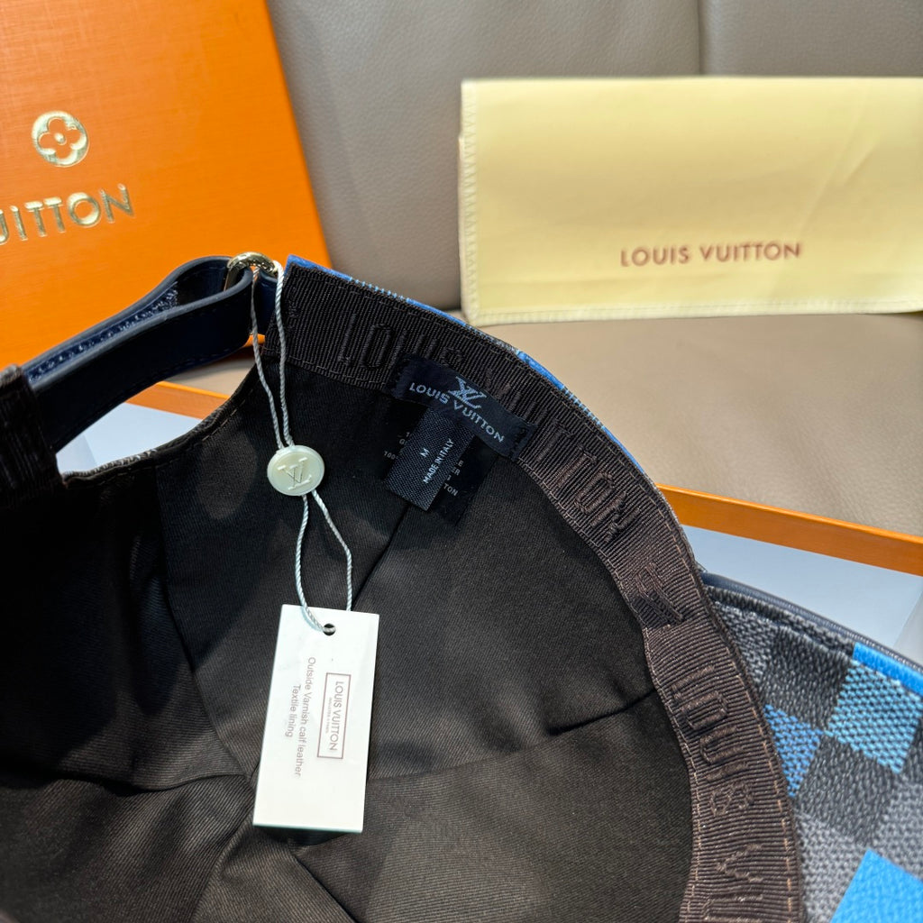 Louis Vuitton cap with dark interior lining and patterned underbrim, hanging price tags