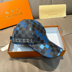 Louis Vuitton baseball cap with blue and black checkered brim and front strap detail
