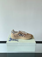 Single beige low-top sneaker with white laces and Burberry check side stripe