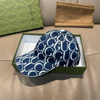 Gucci baseball cap in navy with white GG monogram print, front panel and curved brim.