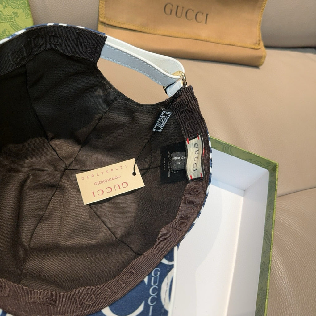 Gucci cap interior view with black lining and adjustable strap, dark fabric edge trim.