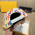 Fendi cap interior, white leather-like strap patch and adjustable strap with tag