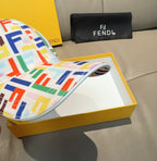 Fendi baseball cap, side profile in colorful geometric FF pattern, brim visible