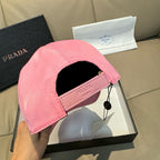 Pink baseball cap with inner strap and Prada logo triangle patch