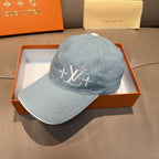 Louis Vuitton denim baseball cap, light blue, front panel with LV logo embroidery.