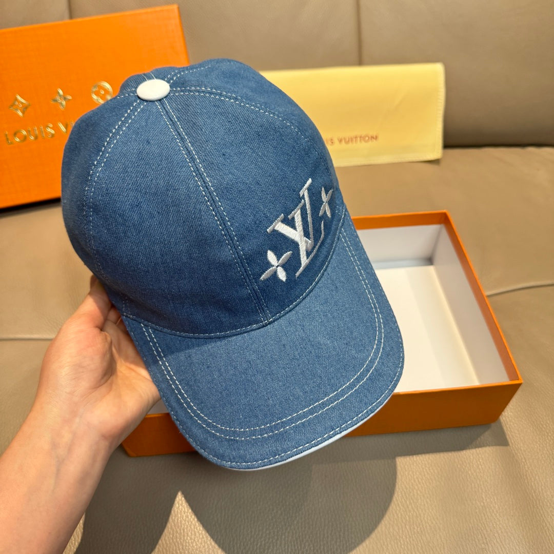 Louis Vuitton blue denim baseball cap with LV logo patch at side