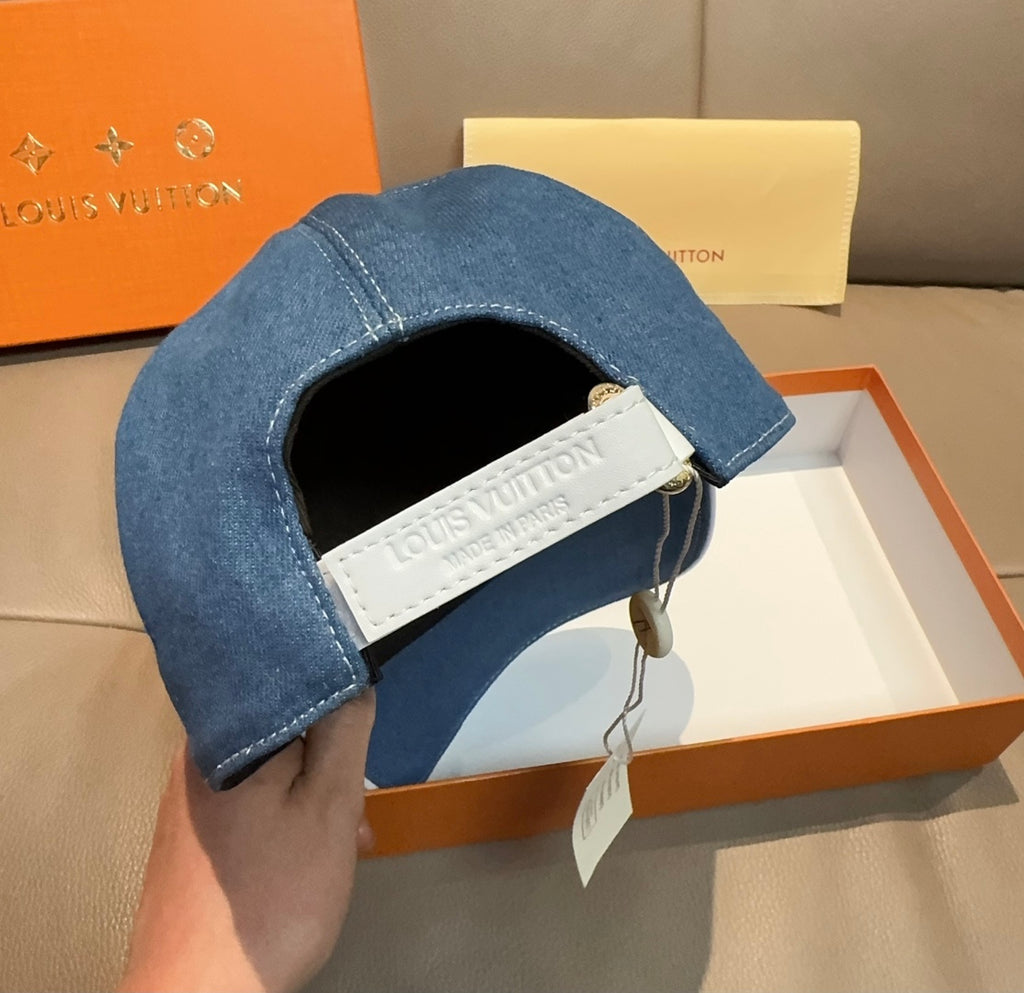 Louis Vuitton denim cap showing inside label and blue fabric brim