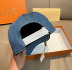 Louis Vuitton denim cap showing inside label and blue fabric brim