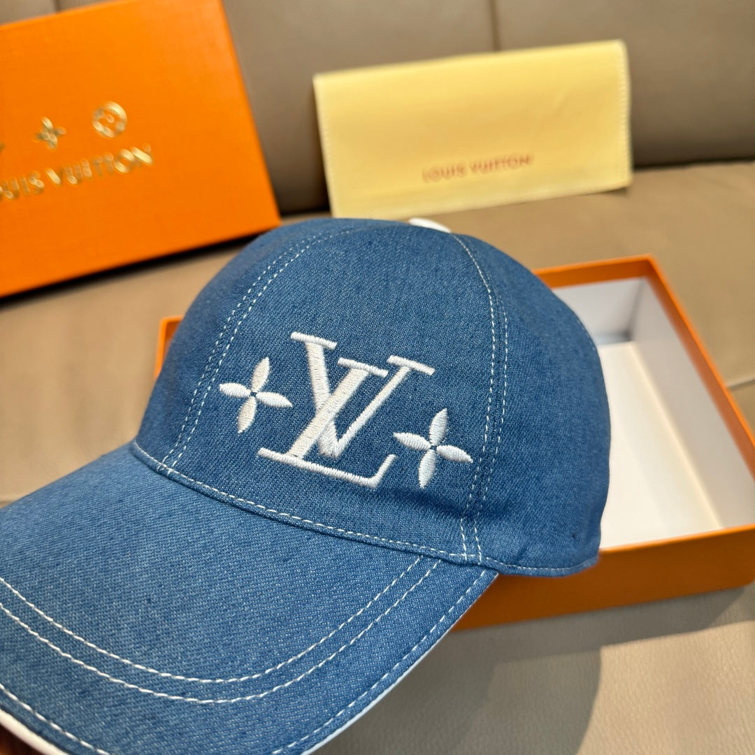Louis Vuitton blue denim baseball cap with LV logo centered on front
