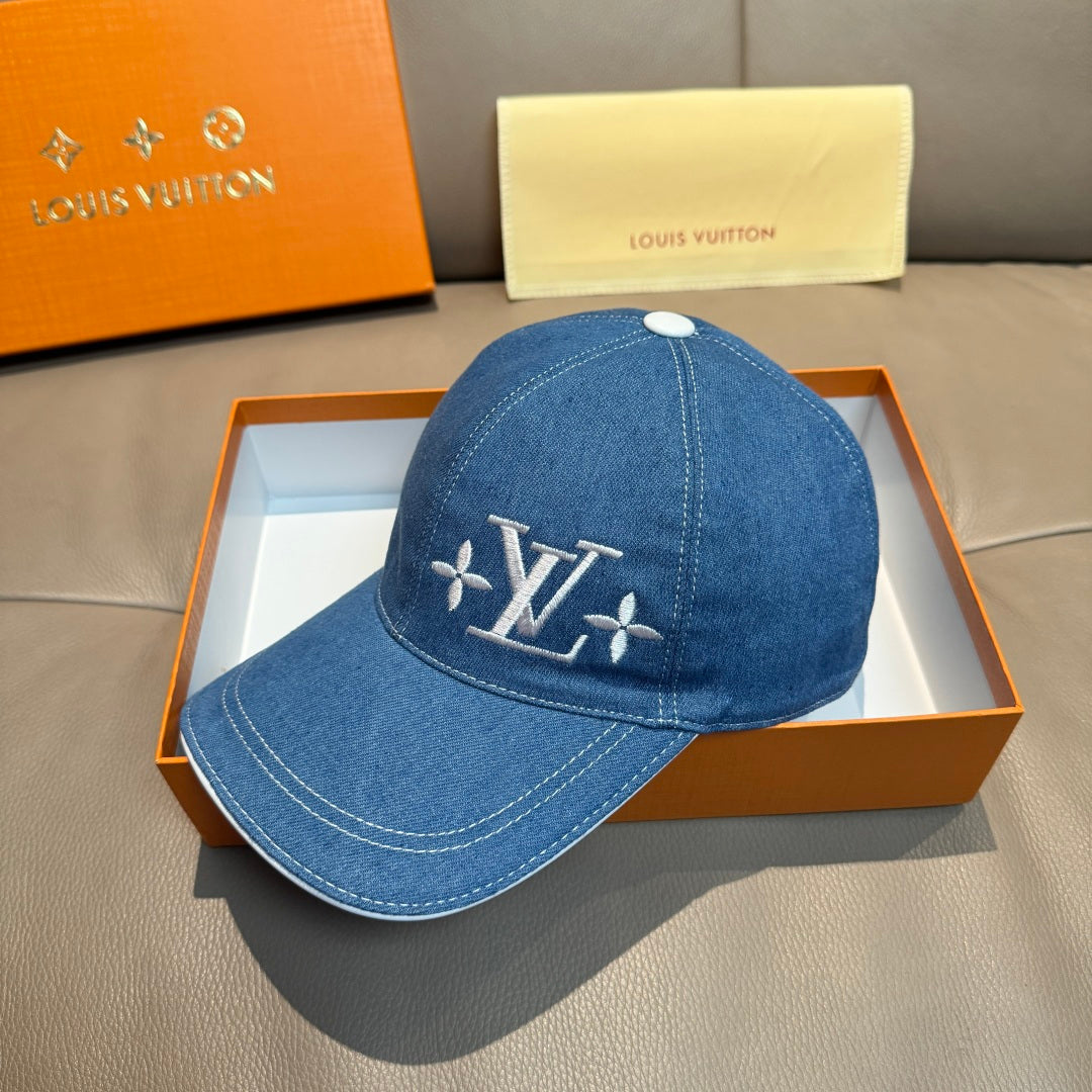 Louis Vuitton blue denim baseball cap with LV logo on front panel