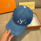 Louis Vuitton blue denim baseball cap with LV logo and stitched brim