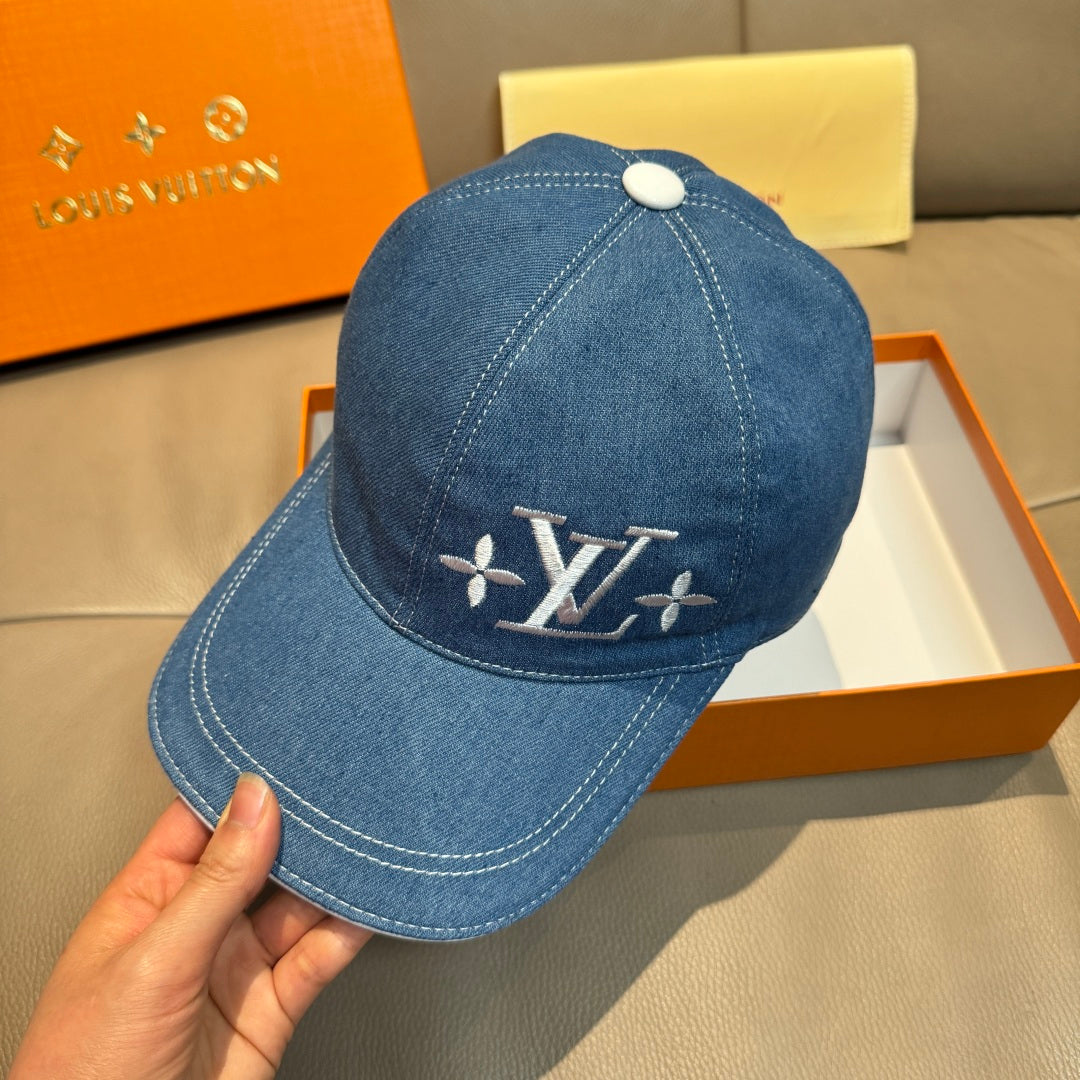 Louis Vuitton blue denim baseball cap with LV logo and stitched brim