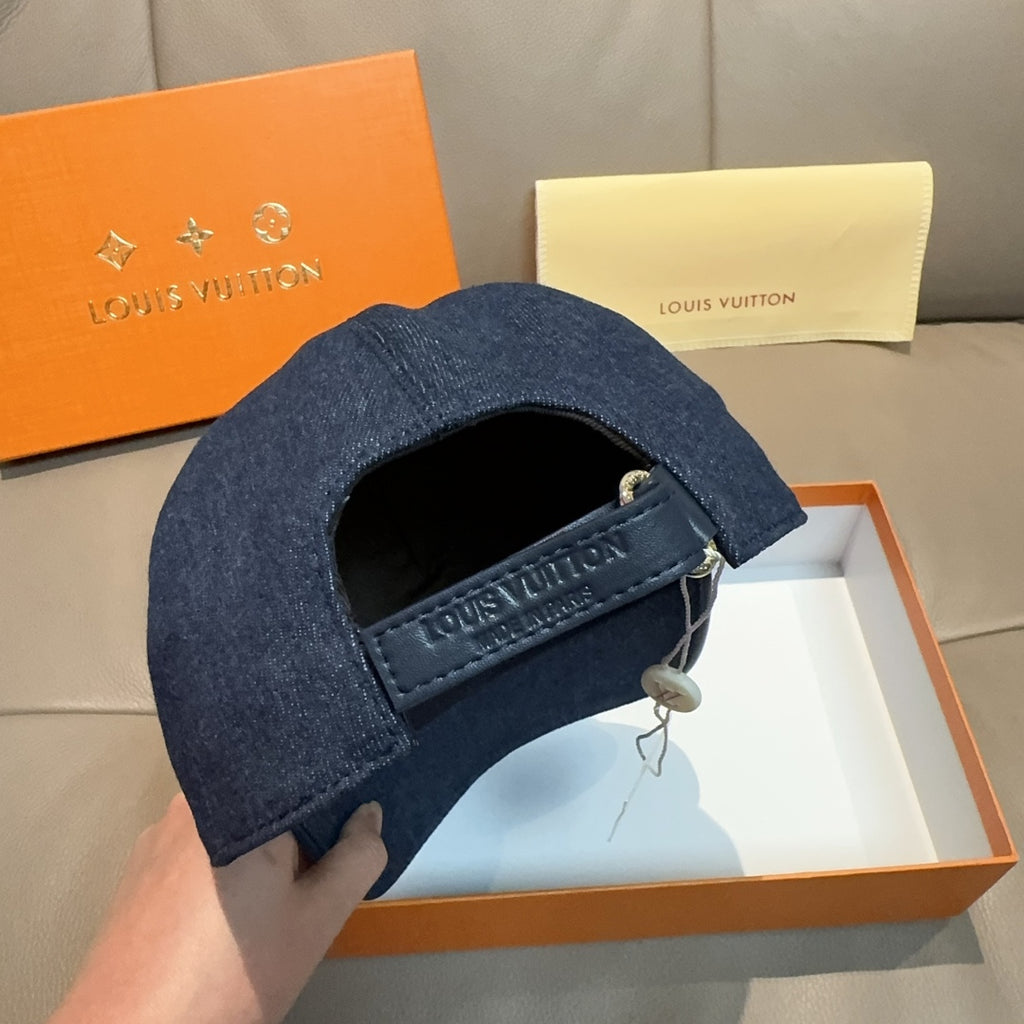 Louis Vuitton denim cap interior opening with black label band; dark blue crown