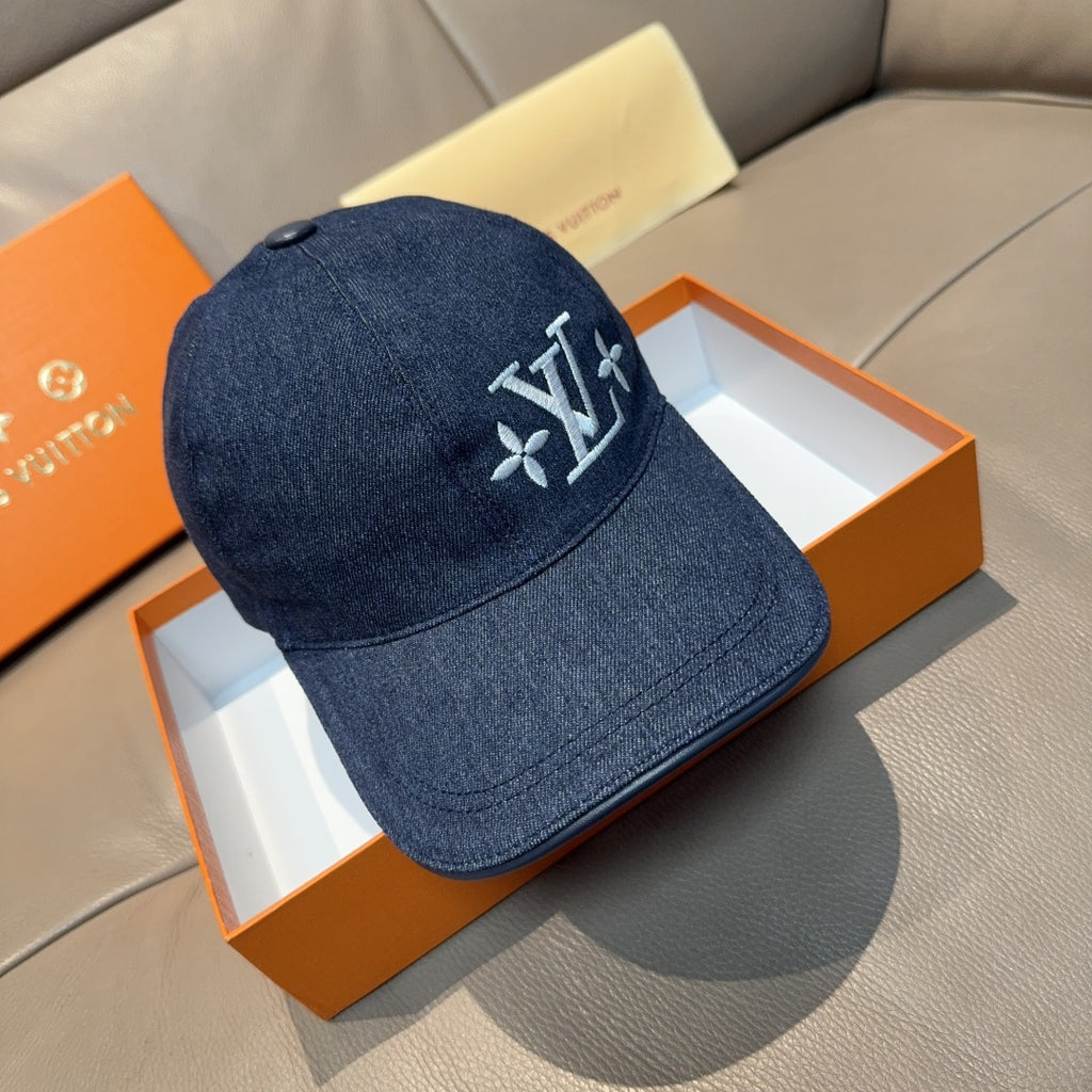 Louis Vuitton denim cap in dark blue with embroidered LV monogram flower logo