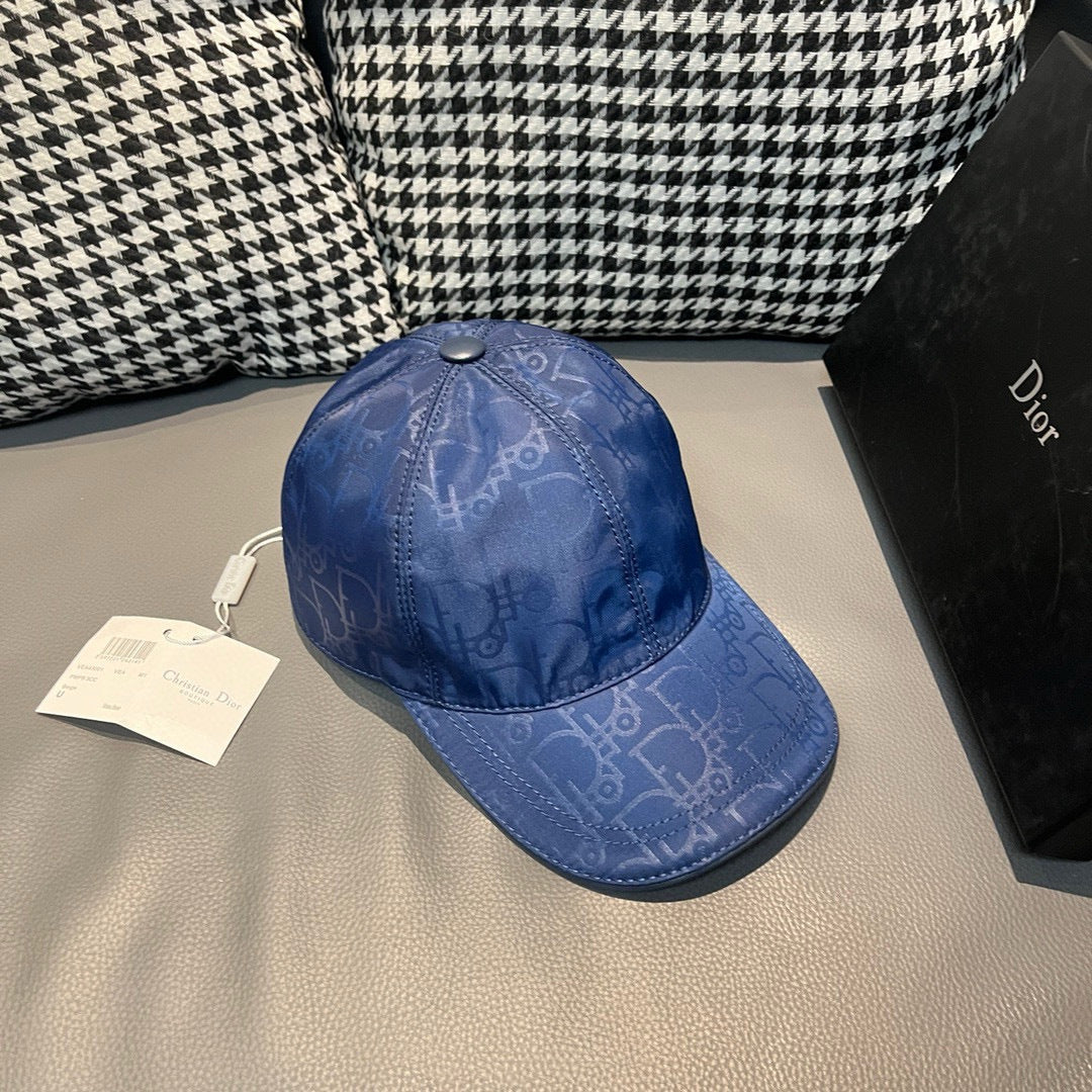 Dior cap in blue with visor brim and stitched crown, monogram print.