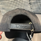 Dior cap with black interior label and adjustable strap across the brim