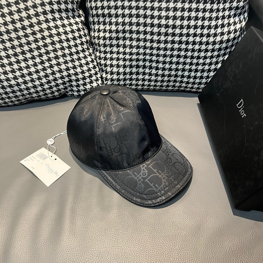 Dior cap with curved brim and monogram print, dark navy base and side panels
