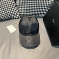 Dior cap in dark gray with monogram print, curved brim, snapback button detail