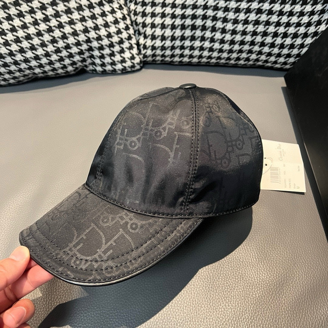 Dior cap with monogram print, curved brim, button top, dark gray fabric