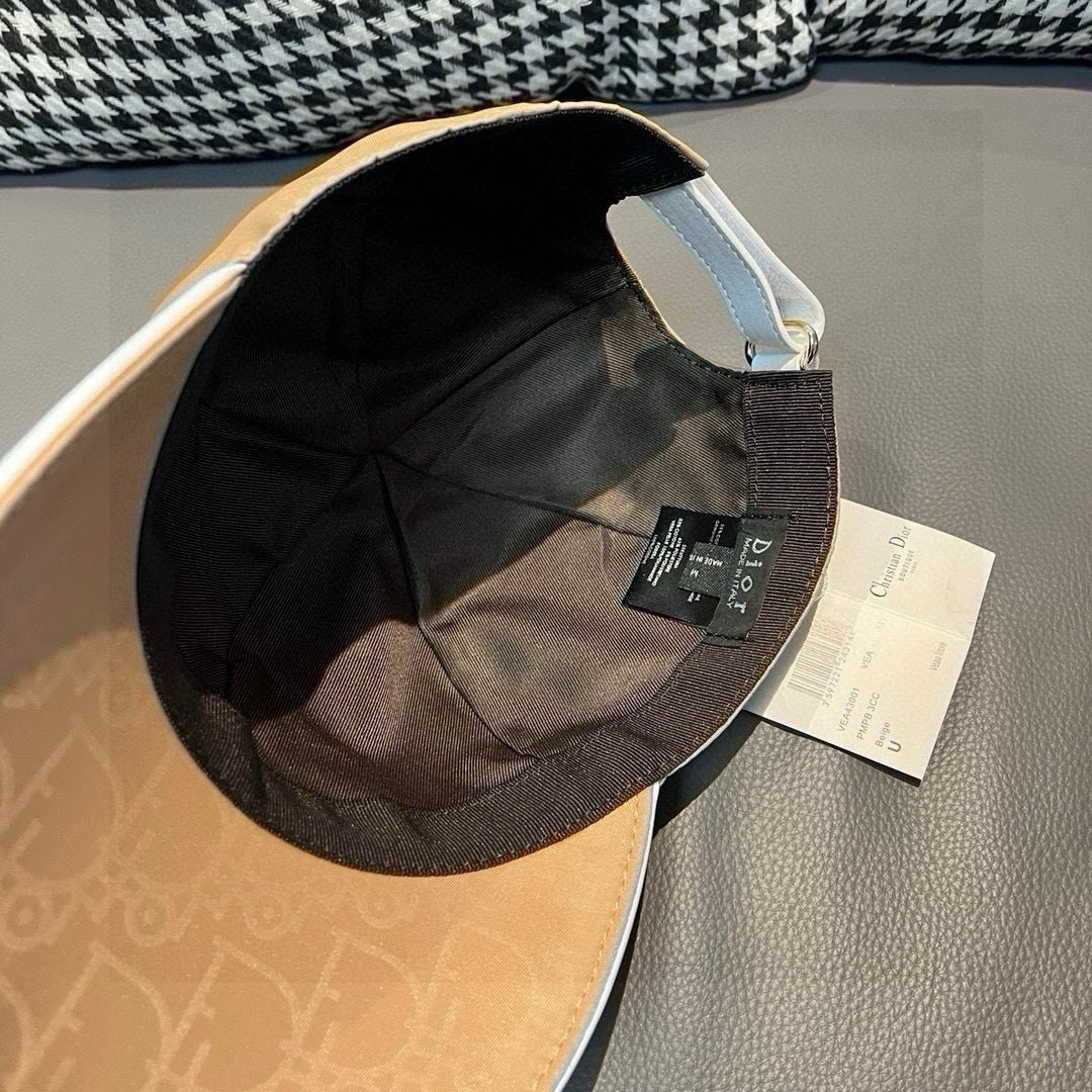 Beige baseball cap interior with black lining and adjustable strap tag