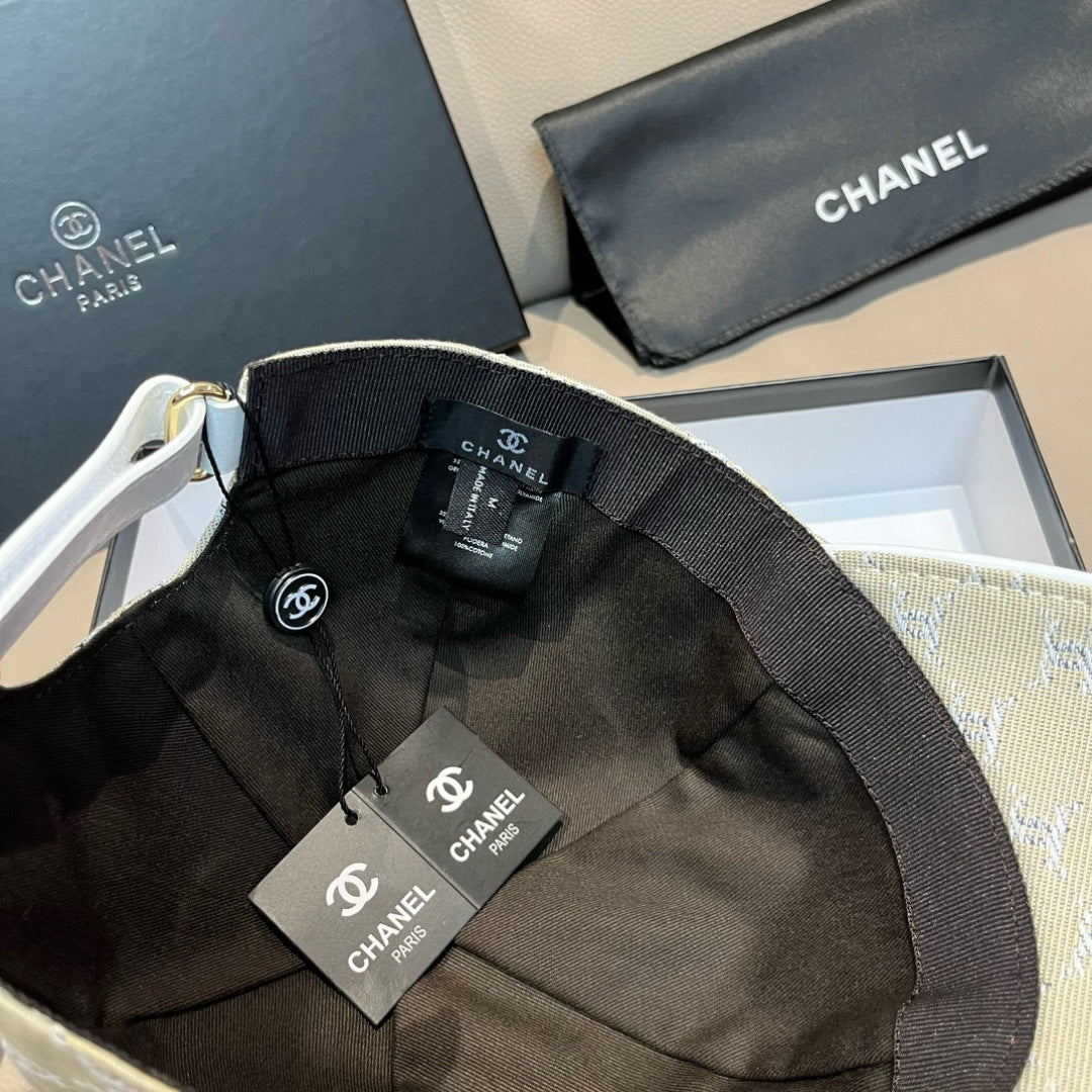 Black baseball cap interior with fabric strap and embroidered logo patches