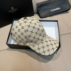 Chanel baseball cap in beige monogram canvas with curved brim and top button, front view
