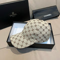 Chanel baseball cap in beige monogram canvas with curved brim and top button