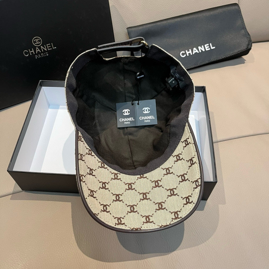 Chanel baseball cap showing black inner lining and beige monogram exterior