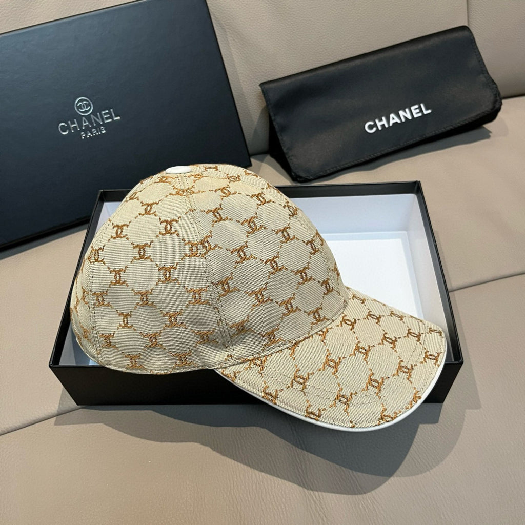 Beige monogram baseball cap with curved brim and top button; side view