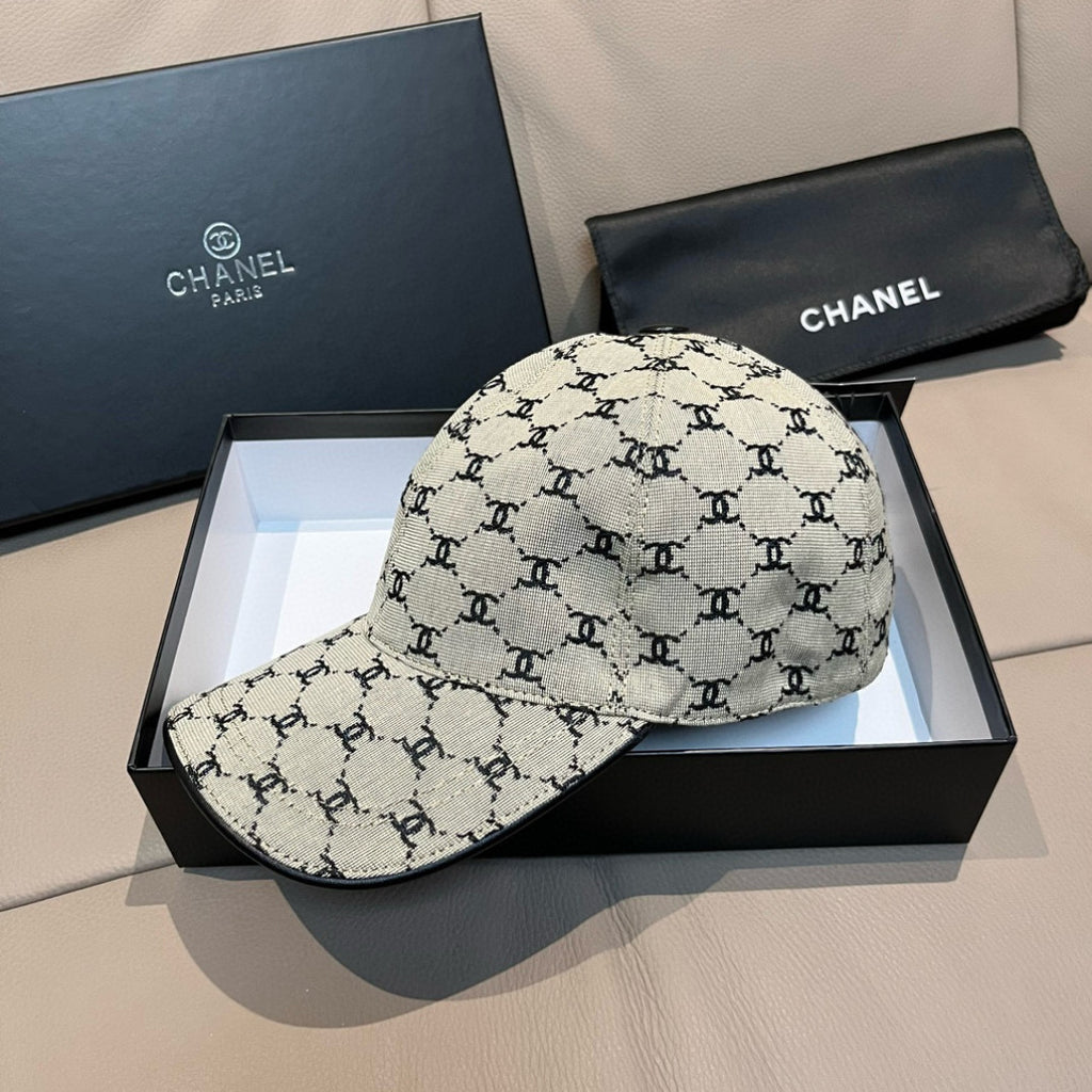 Chanel baseball cap with beige canvas and black monogram print, curved brim
