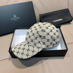 Chanel baseball cap with beige canvas and black monogram print, curved brim