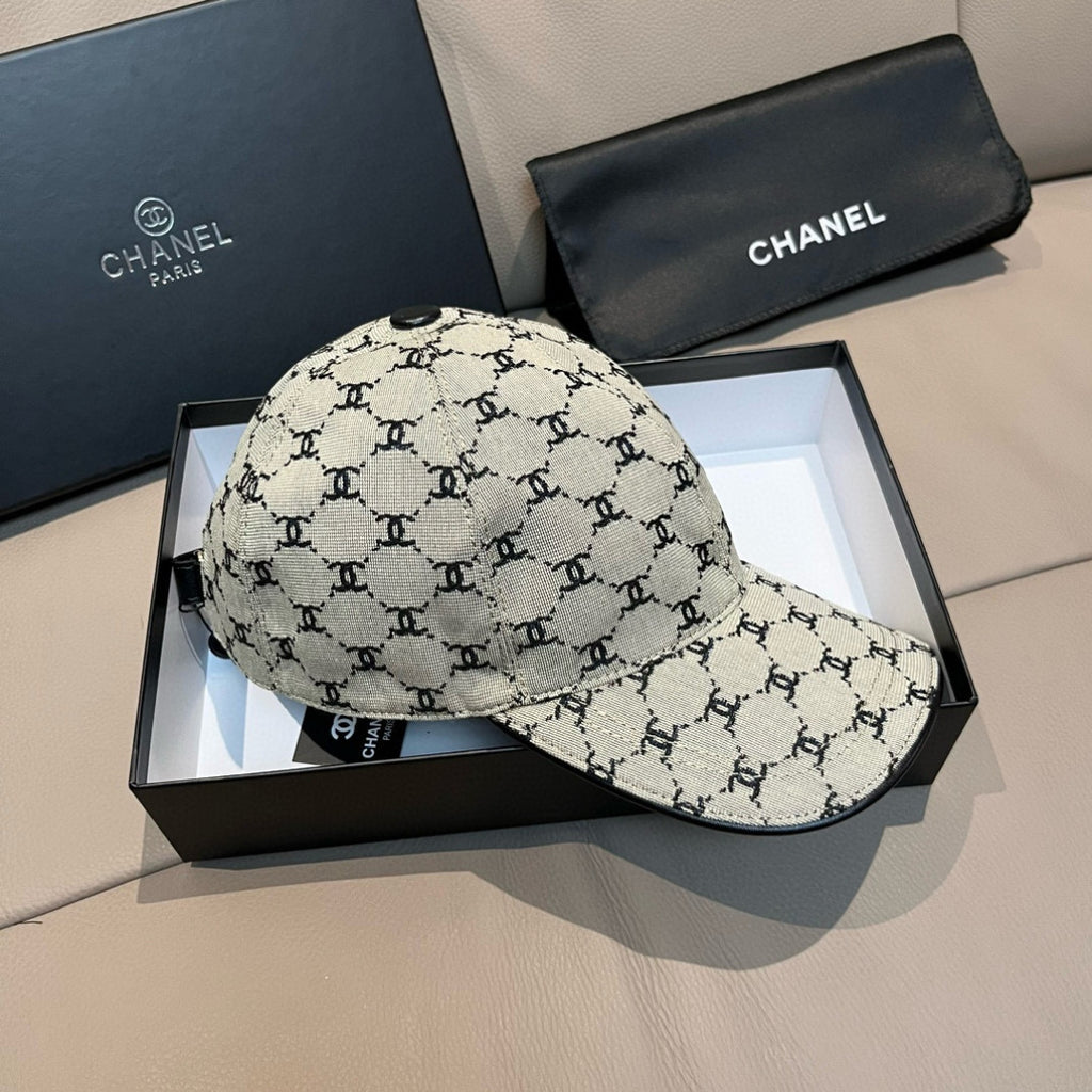 Chanel baseball cap with beige-and-black monogram pattern, curved visor