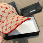 Baseball cap brim detail with red edge stitching on logo-pattern fabric