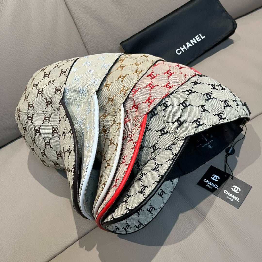 Baseball cap with beige fabric and multi-color logo pattern, side view