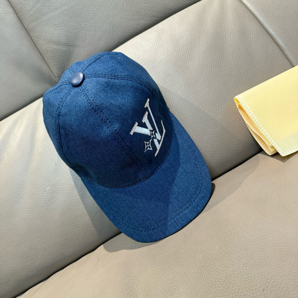 Blue denim baseball cap with white front logo and round top button