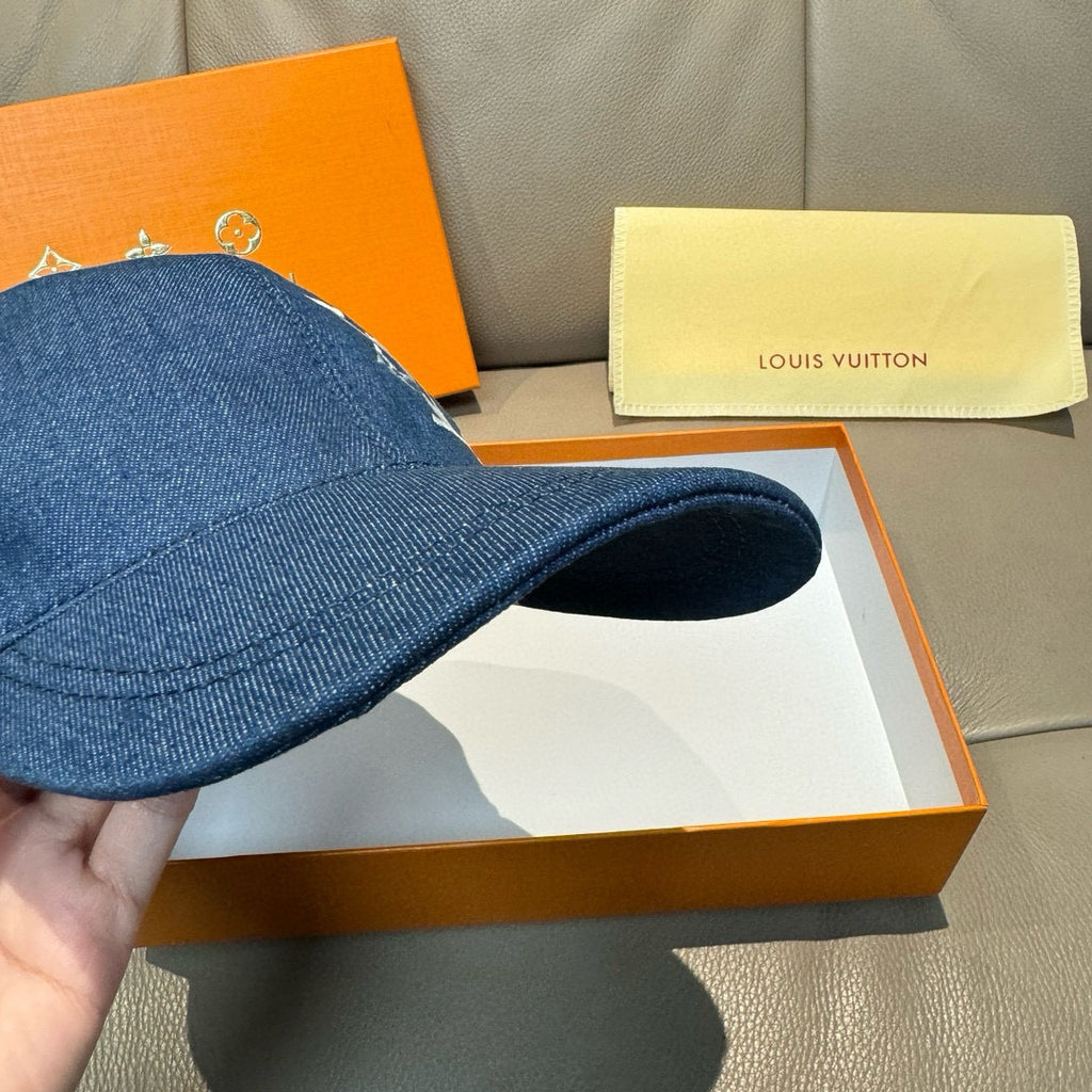 Blue denim baseball cap, side profile with curved brim