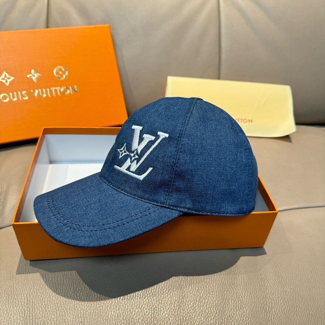 Blue denim baseball cap with large white logo on front panel