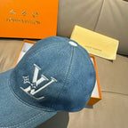 Blue denim baseball cap with LV logo embroidery on the front panel.