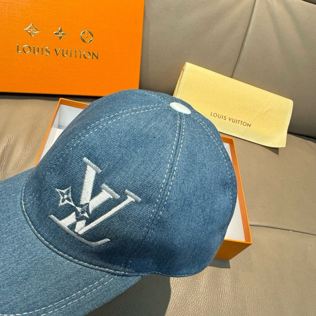 Blue denim baseball cap with LV logo embroidery on the front panel.